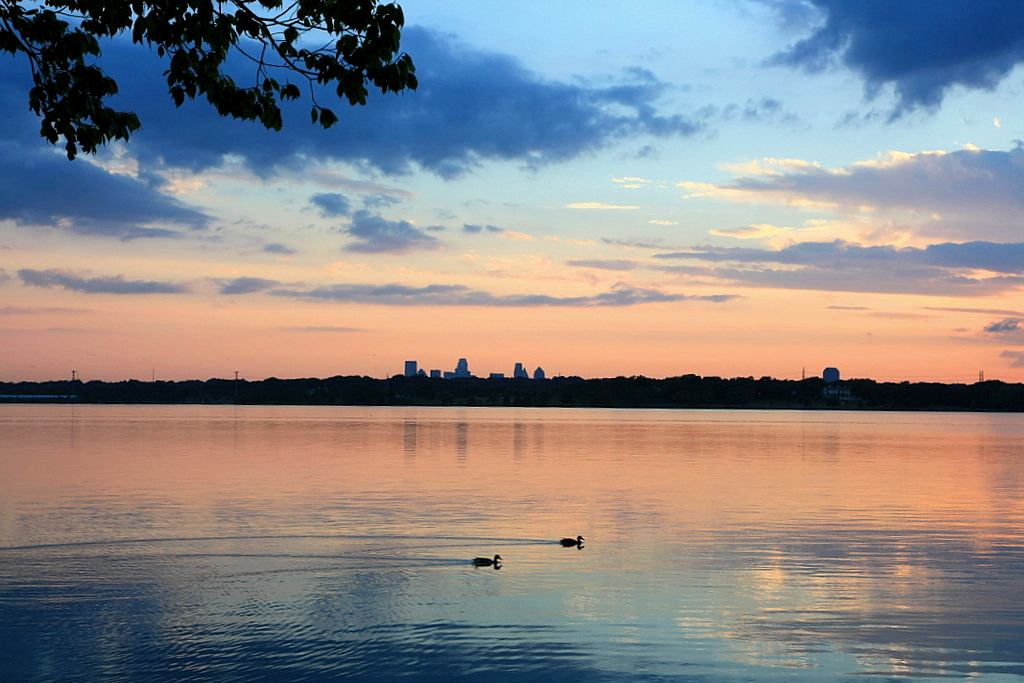 This is an image of what White Rock Lake looks like, either at sunrise or sunset. 